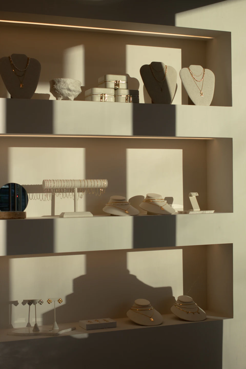 Display shelves filled with elegant jewelry and accessories
